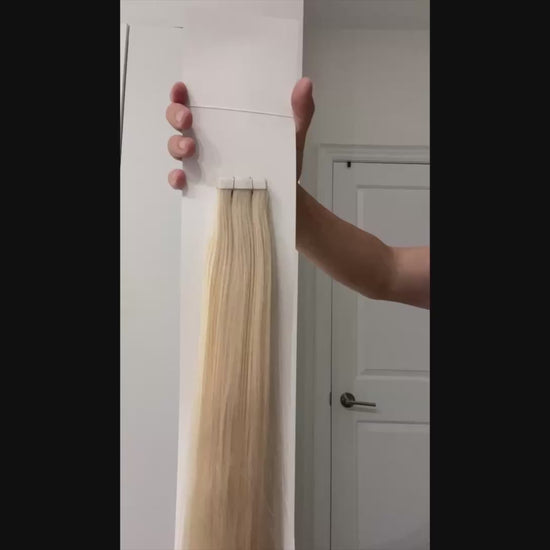 platinum blonde #1001 tape in hair extensions – straight strands with adhesive tape tabs