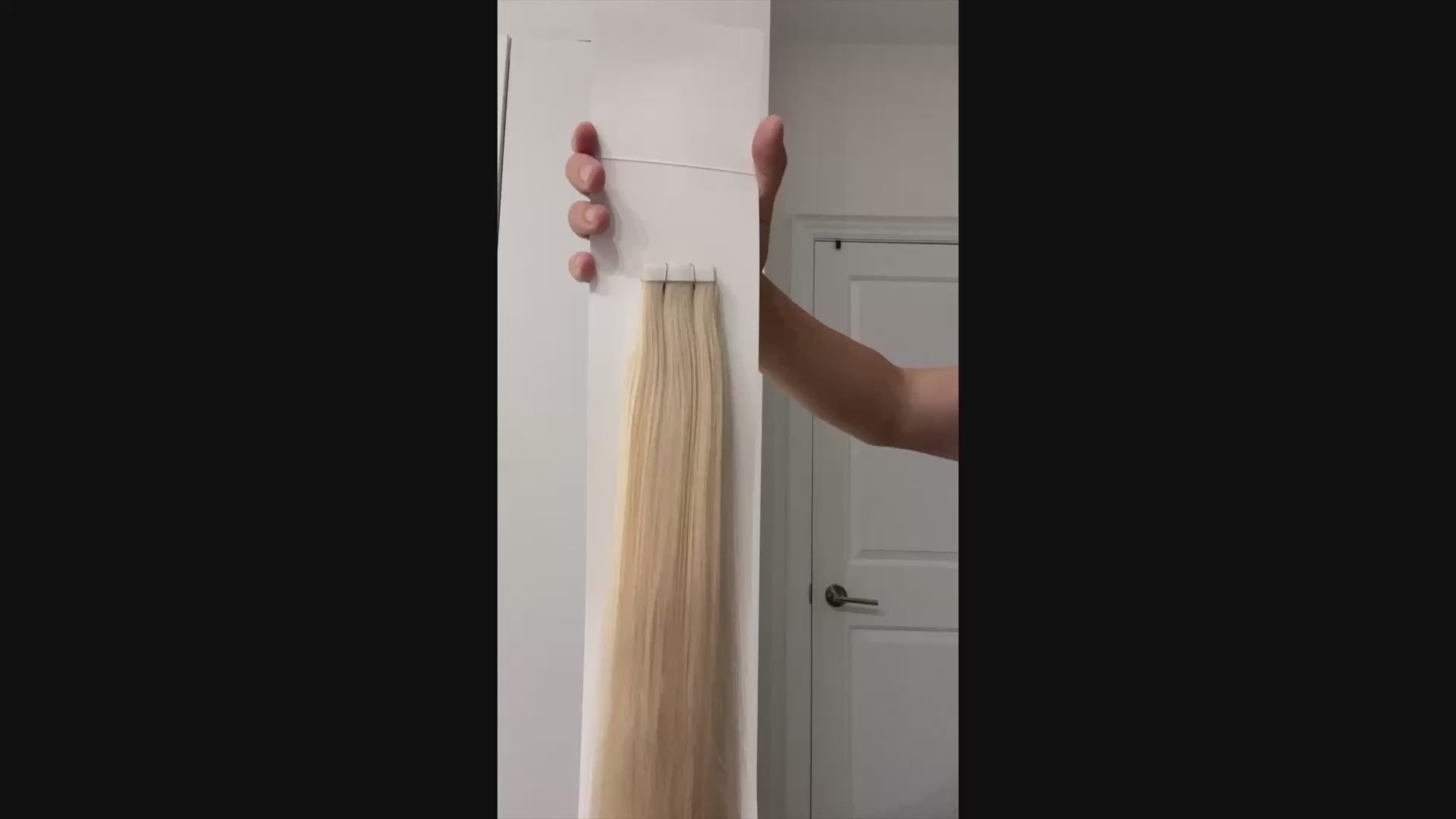platinum blonde #1001 tape in hair extensions – straight strands with adhesive tape tabs